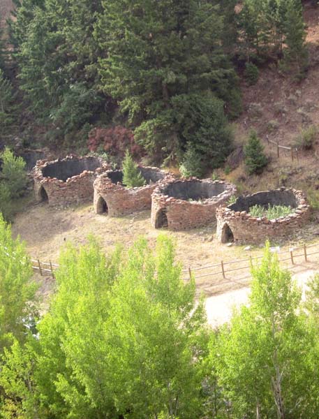 8.-Four-of-the-remaining-Bayhorse-charcoal-kilns.-They-once-were-complete-beehive-shaped-structures.