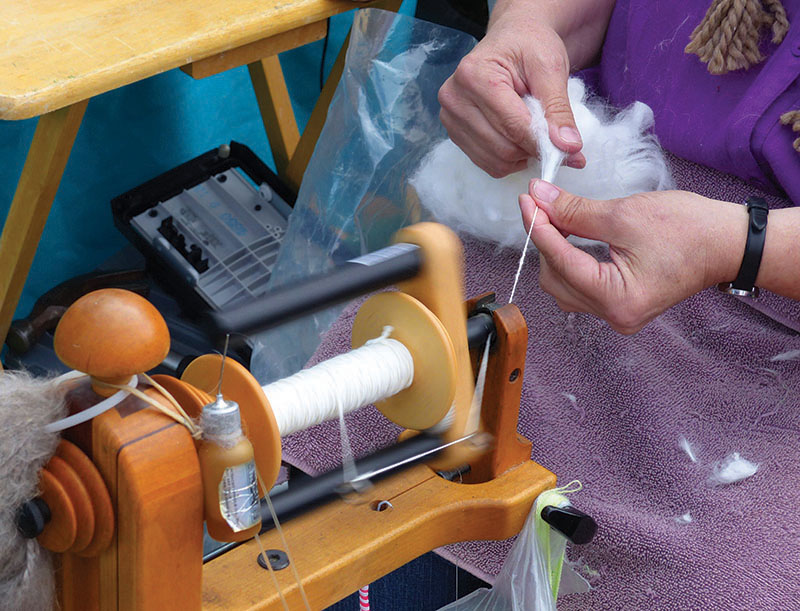 Folklife-Fair_spinning-wool-close-up-view.-Credit-Carol-WallerX