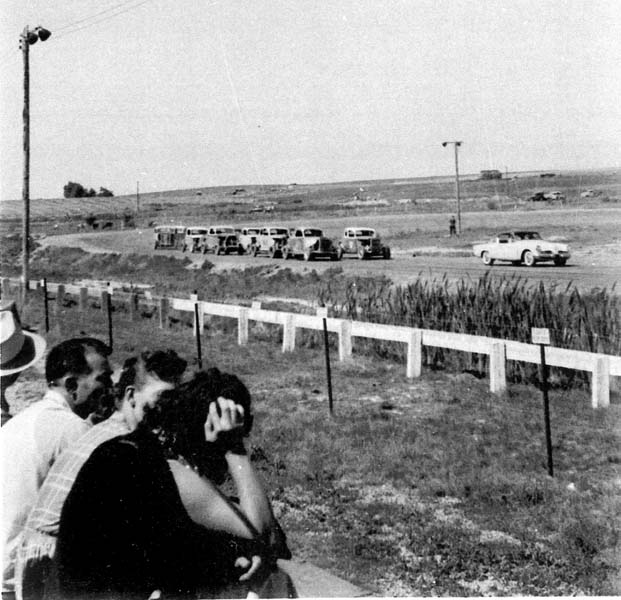 Spectators watch from the stands during the start of the race.