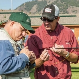 Mike McKenna (right) gives a few tips