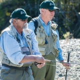 Tom Rogers (right) of Boise watches the results of his instruction