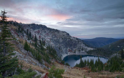 Idaho, North Central, Nez Perce National Forest, Grangeville. One of the Gosplel Lakes in the Gospel Hump Wilderness Area under an autumn sunset.