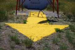 Giant aviation arrow at Dubois airport after painted yellow