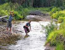 andrewcatchingafishbyadambussan
