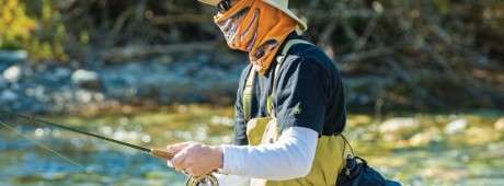 An angler joins a week-long retreat in Copper Basin to help teach cancer victims how to fly fish.