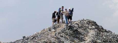 Hesitantly, the author agrees to accompany a group of strangers on a climb to two of Idaho's three highest mountain peaks.