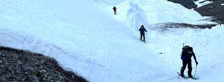 Adventurous friends scale huge Mount Breitenbach (the author running partway), and then ski or snowboard down. 